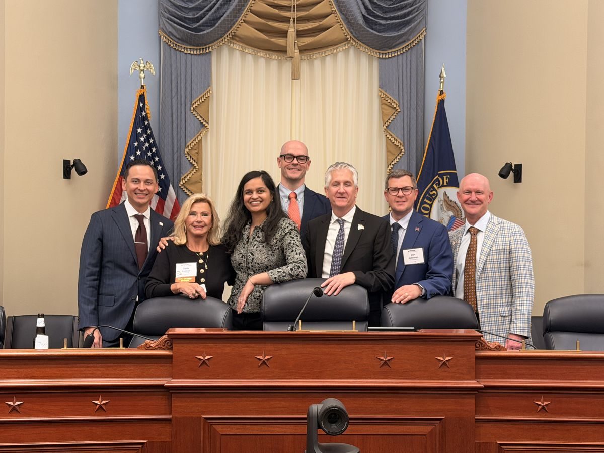 Solera delegation and NIADA leaders in a House hearing room, 2026